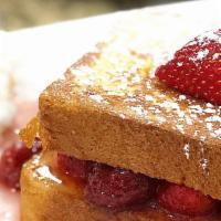 Strawberry French toast · Brioche French toast with strawberry compote, mascarpone cheese and dusted with powdered sug...