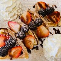 Easiest Belgian Waffles · Waffles topped with strawberries, blackberries and blueberries, drizzled with hershey chocol...