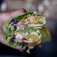 Rainbow Wrap · Warm spinach tortilla, cucumbers, red onions, tomatoes, lettuce, purple cabbage, shredded ca...