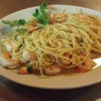 Shrimp Scampi · Shrimp sauteed with our lemon garlic and butter sauce over linguini.
