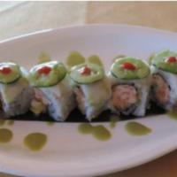 Jade Roll · Spicy crabmeat, lobster salad, and cucumber on the inside topped with super white tuna, jala...