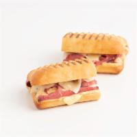 Steak 'n Swiss Panini · Steak lovers . . . rejoice! This Panini Melt features mounds of Carved Prime Rib and melty-c...