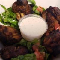 Assorted Wings Platter · A platter full of different varieties of wings...some traditional grilled with baba kabab sp...