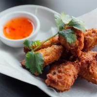 A9. Wings · Fried chicken wings with sweet chili sauce.