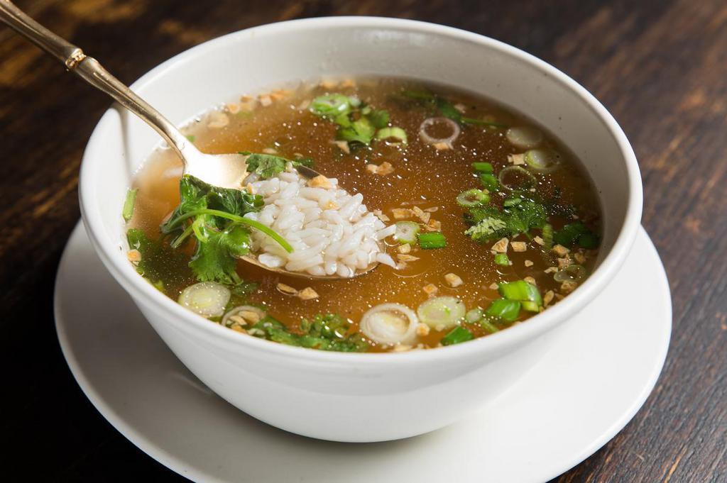 S4. Rice Soup · Clear broth rice soup with fresh ginger, pepper and scallions.