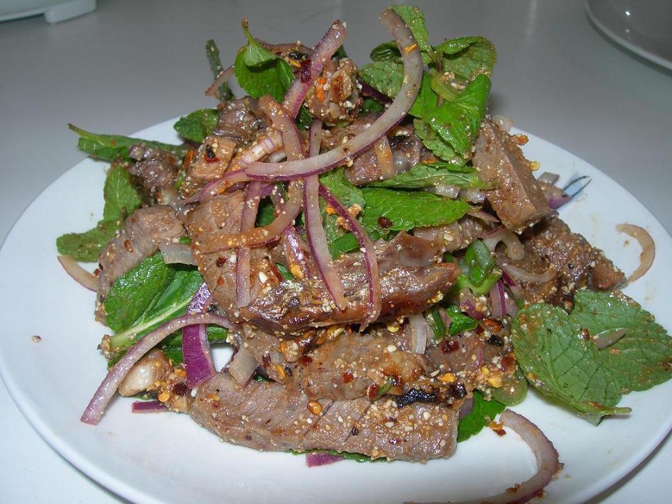 Y10. Namtok Salad · Sliced meat salad, red onion, mint, scallion, cilantro, ground
toasted jasmine rice, chili lime dressing. Spicy.