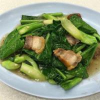 E9. Pad Ka Na · Sauteed Chinese broccoli and garlic in oyster sauce. Served with jasmine rice. 