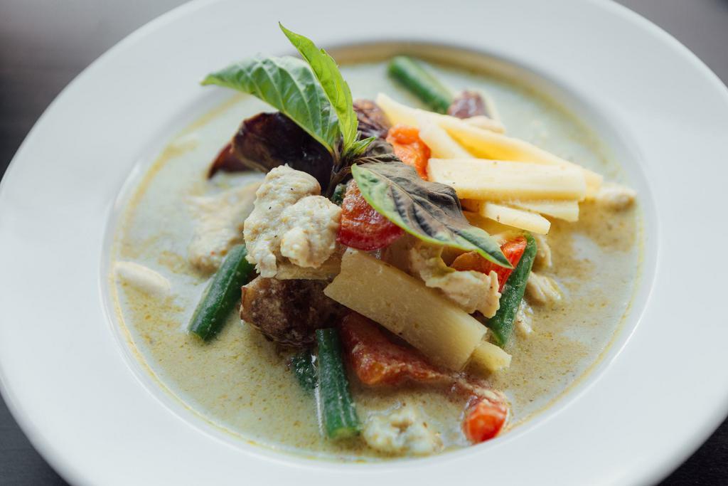 C2. Green Curry · Coconut curry, eggplant, string beans, bell peppers, bamboo shoots and basil leaves. Served with jasmine rice.  Spicy.