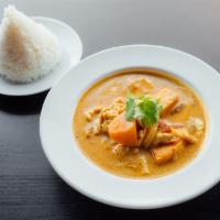 C4. Massaman Curry · Coconut curry, peanut, onions, and potatoes. Served with jasmine rice.  Spicy.
