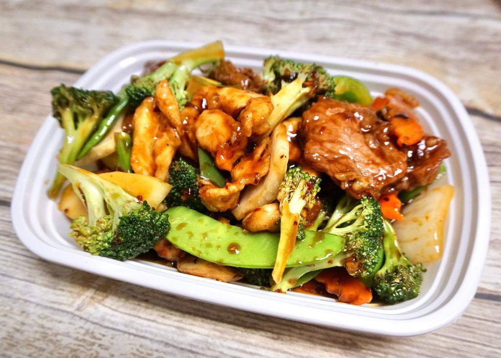 S6. Triple Delight · Shrimp, beef and chicken with mixed vegetables in brown sauce.
