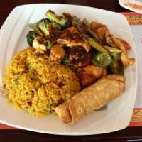 11. Chicken with Garlic Sauce Dinner Combo · Served with pork fried rice and egg roll. Hot and spicy.