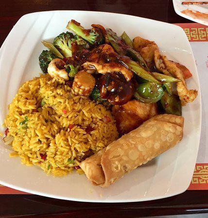 11. Chicken with Garlic Sauce Dinner Combo · Served with pork fried rice and egg roll. Hot and spicy.