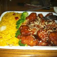 13. Sesame Chicken Dinner Combo · Served with pork fried rice and egg roll. Hot and spicy.