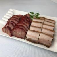 303. BBQ Platter 2 Items · Choose 2 from these items:
BBQ Pork
Steamed Empress Chicken
Roast Duck