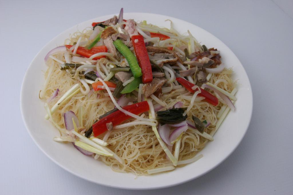 615. Rice Steak Noodle with Duck Meat and Preserved Vegetable · 