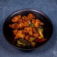 General Tso's Chicken · Fried dark meat chicken sauteed with bell peppers and onions in sweet and spicy sauce. Serve...