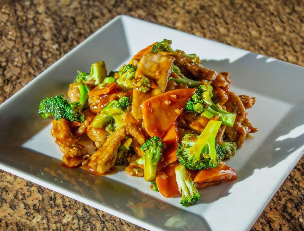 Beef Broccoli · Sauteed with carrots and broccoli in brown sauce. Served with your choice of rice.