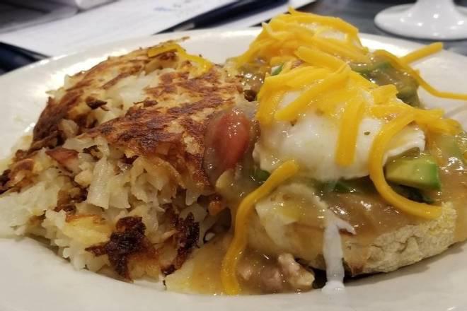 *Green Chili Benedict* · split toasted english muffin, avocado, poached eggs, pork green chili ＆ cheddar cheese served with hash browns