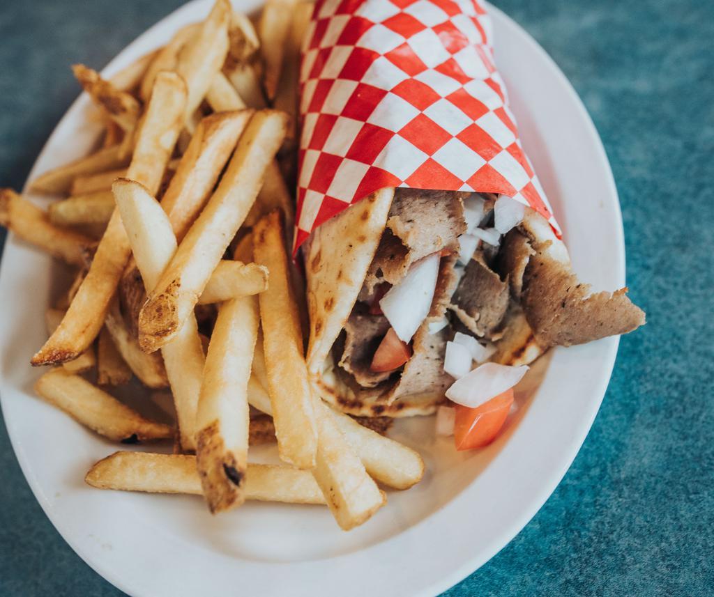 *Gyro Sandwich* · thin slices of seasoned ground lamb ＆ beef, shaved to order off the spit rolled in warm pita with tzatziki, diced onions ＆ tomatoes ＆ choice of side