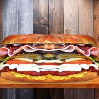 Real Madrid Torta · Turkey sausage, pork chorizo, egg, bacon, ham, head cheese, breaded steak, melted cheese, to...