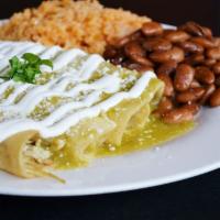 #4. Enchiladas · 4 enchiladas chicken or beef on layered corn tortillas in a green sauce with white cheese an...