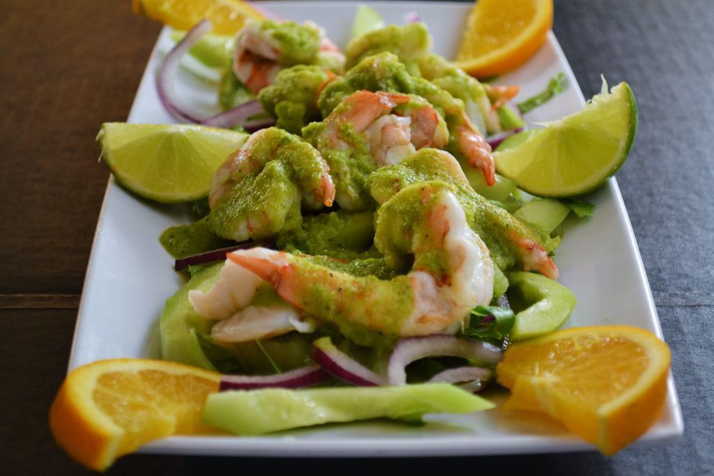 Camarones Agua Chile Verdes o Rojos · Shrimp marinated with spicy lime in a cucumber sauce. 