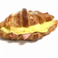 Egg, Ham, and Cheese Croissant · Cooked meat from the upper part of a pig's leg. A flaky French pastry.