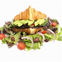 Veggie Croissandwich · Onion, tomato, avocado, roasted peppers, spinach, and cucumber, with a homemade veggie sprea...