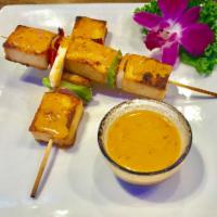 Fish-Tofu Yakitori ( 2 sticks) · Grilled fish-tofu and vegetable on skewer with  spicy red curry sauce