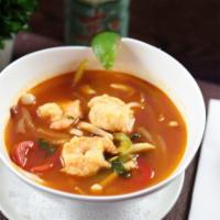 Shrimp Tom Yum Soup · Thai style hot and sour with lemongrass and basil. Hot and spicy.