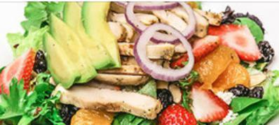 Roasted Chicken & Fruit Poppyseed Salad · Qith slices of fresh grilled chicken breast, berries, grapes, bananas, & avocado, topped wit...