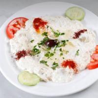 Babaganoush · Chopped roasted eggplant dip, with fresh herbs, lemon juice, and olive oil. Served with pita...