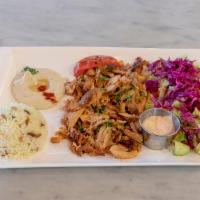 Chicken Gyro Plate · Daily cut and cooked chicken meat gyro, rice, hummus and salad(tomatoes, cucumber, romaine h...