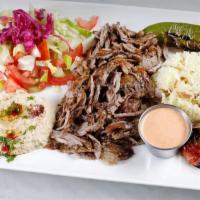 Lamb and Beef Gyro Plate · Daily cut and cooked lamb and beef meat gyro, rice, hummus and salad(tomatoes, cucumber, rom...