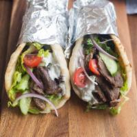 Lamb & Beef Gyro PITA · Daily cut and cooked lamb and beef meat gyro, tomatoes, cucumber, romaine hearts, tzatziki s...