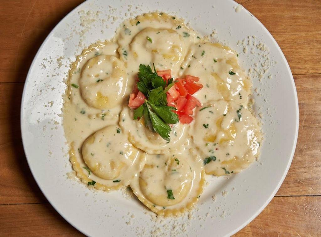 Cheese Ravioli with Pink Sauce · Tender ravioli filled with ricotta and parmesan.