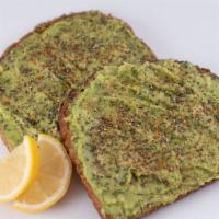 Avocado Toast · 2 slices of organic whole-grain toast topped with avocado, spices, light cayenne, chia seed,...