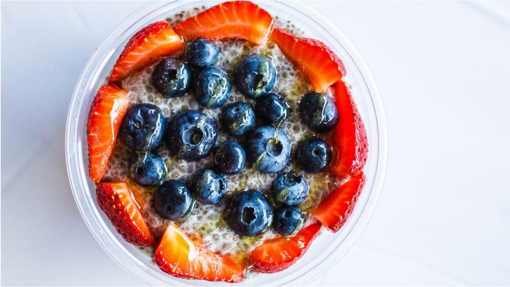 Chia Pudding Parfait · Chia pudding prepared with almond milk topped with fresh berries and your choice of honey or agave.