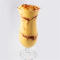 Mango Con Chile · We know you wish you were relaxing on a beach eating a chili mango, we do too. A creamy smoo...