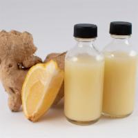 Lemon Ginger Wellness Shot · Raw, cold pressed - lemon and ginger. Energizing, immune system boost. Add cayenne for added...