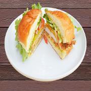 Pork Chop Burger · Our 6 oz. pork chop is de-boned, lightly battered, deep-fried and then served with lettuce, ...