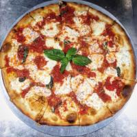 Margherita Pizza · Fresh mozzarella, tomato and fresh basil.