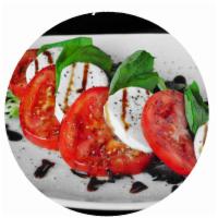 Caprese · Drizzled with extra virgin olive oil, balsamic reduction and sea salt.