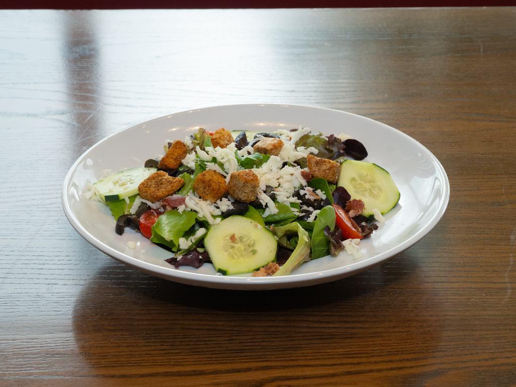 The Ranch Salad · Mixed greens, olives, cucumber, mozzarella, tomatoes, bacon, croutons and mixed with ranch dressing. Add chicken for an additional charge.