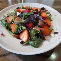Strawberry Fields Salad · Baby spinach and arugula, red onions, strawberries, candied walnuts, feta and red onions wit...