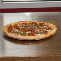 Smokin' Goodfella Pizza · Fresh mozzarella, roasted pepper cream sauce, tri-colored roasted bell peppers, sausage with...