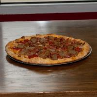 Meat Lovers Pizza · Fresh mozzarella, pepperoni, sausage, Canadian ham, spicy capicola, bacon and sliced meatbal...