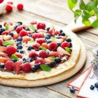 Nutella Dessert Pizza · Mascarpone, Nutella, raspberries, blueberries and strawberries topped with powder sugar.