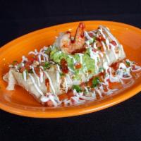Mojo de Ajo Burrito · Prawns grilled in garlic butter with rice, beans, cheese, cabbage, guacamole, sour cream, ch...