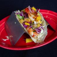 Mojo de Ajo Taco · Prawns grilled in garlic butter with cabbage and habanero mango fruit salsa.